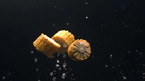 Pieces of corn flying in slow motion Stock Footage 157842989