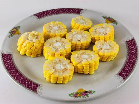 Pieces of corn isolated on white background Foto stock