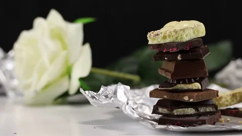 Pieces of different chocolate with different fillings Stock Footage 125013200