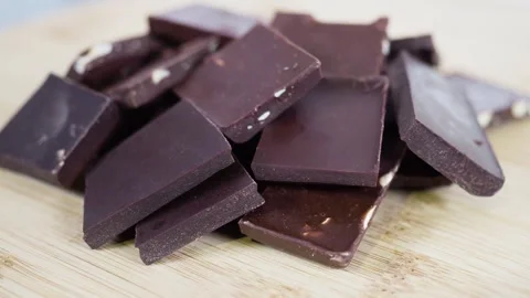 Pieces of different milk and dark chocolat? Video stock 246181736