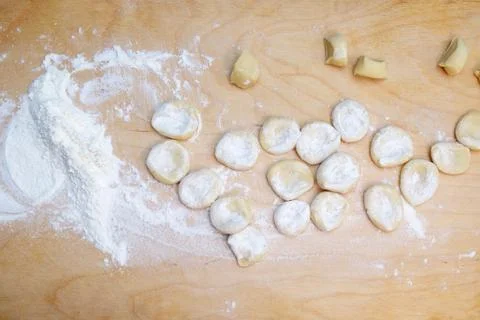 Pieces of dough on table Stock Photos