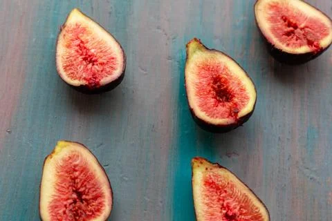 Pieces of fig on a table, ideal to recommend for some diets or meals Stock Photos