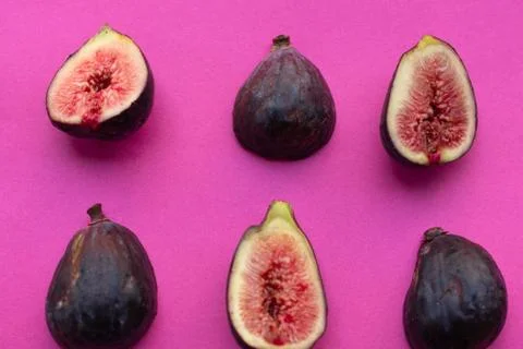 Pieces of fig on a table, ideal to recommend for some diets or meals Stock Photos