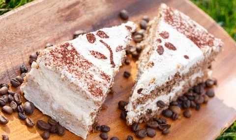 Pieces of filled cake with icing Stock Photos
