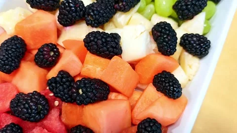 Pieces of fresh fruit salad Stock Footage 332119663