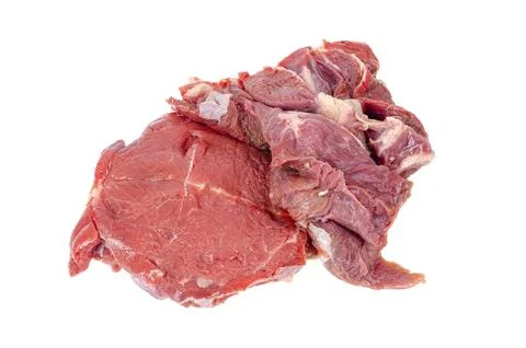 Pieces of fresh red young beef isolated on white background. Studio Photo Stock Photos