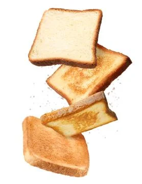 Pieces of fresh toast bread falling on white background Stock Photos