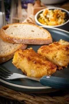 Pieces of fried cod fillet. Stock Photos