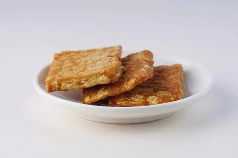 Pieces of fried tempeh Stock Photos