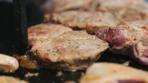 Pieces of grilled meat on the grill Stock Footage 82656983