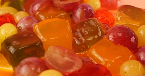 Pieces of jelly in a spoon. Stock Footage 219968975