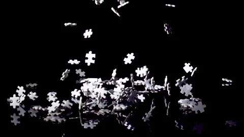Pieces of Jigsaw Puzzle falling. Finding a Solution for Business problem. Stock-Footage 160748133