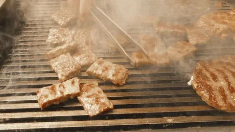 Pieces of meat are fried 스톡 동영상 304740059