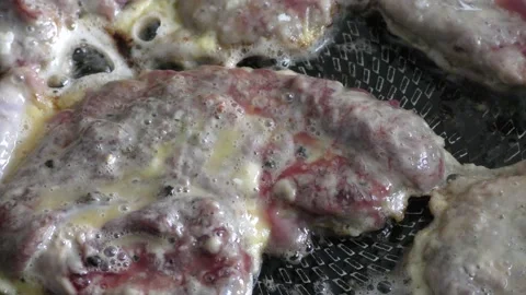 Pieces of meat are fried in a pan.  healthy food concept 스톡 동영상 153254781