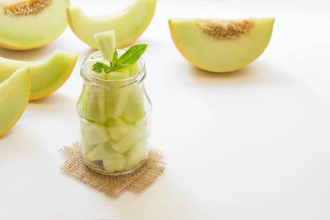Pieces of melon in a jar. Stock Photos