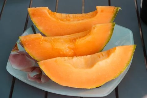 Pieces of melon Stock Photos