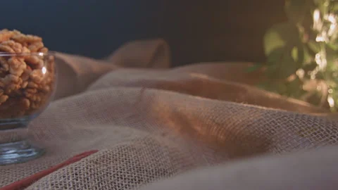 Pieces of nuts in a container Stockbeeldmateriaal 131456671