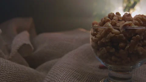 Pieces of nuts in a container Stockbeeldmateriaal 131461654