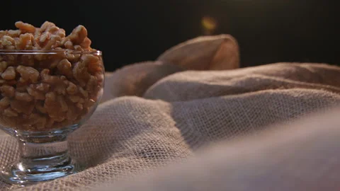 Pieces of nuts in a container Stockbeeldmateriaal 131462314