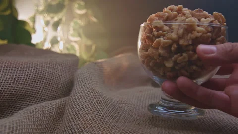 Pieces of nuts in a container 動画素材 131463039