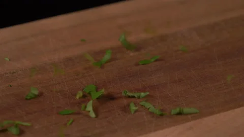 Pieces of Parsley Falling 4K Stock-Footage 131076215