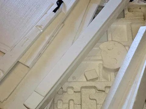 Pieces of Polystyrene foam, a lightweight, rigid plastic made from styrene .. Stock Photos