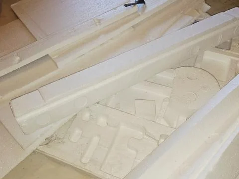 Pieces of Polystyrene foam, a lightweight, rigid plastic made from styrene .. Stock Photos