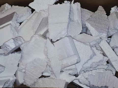 Pieces of Polystyrene foam, a lightweight, rigid plastic made from styrene .. Stock Photos