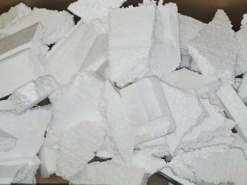 Pieces of Polystyrene foam, a lightweight, rigid plastic made from styrene .. Stock Photos
