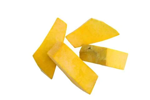 Pieces of pumpkin on a white background Stock Photos