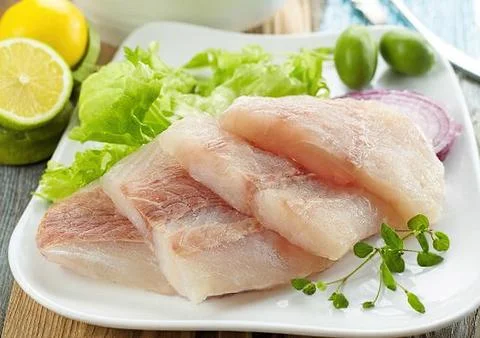 Pieces of raw fish Stock Photos
