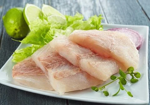 Pieces of raw fish Stock Photos