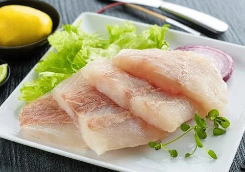 Pieces of raw fish Stock Photos