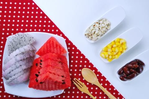 Pieces of refreshing watermelon and dragon fruit Stock Photos