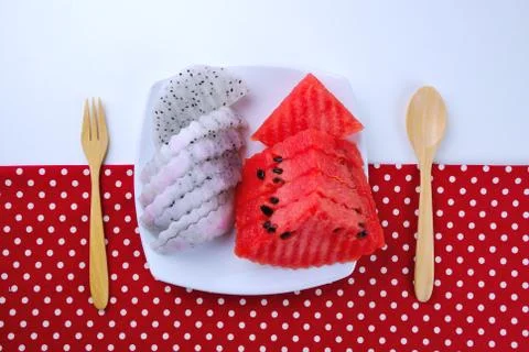 Pieces of refreshing watermelon and dragon fruit Stock Photos