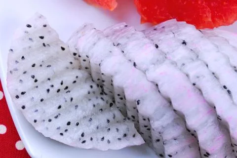Pieces of refreshing watermelon and dragon fruit Stock Photos