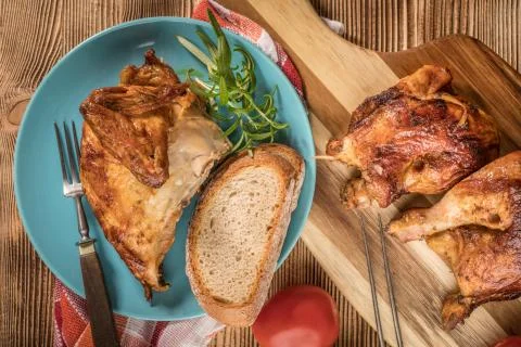 Pieces of roast chicken. Stock Photos