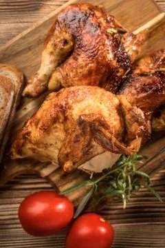 Pieces of roasted chicken. Stock Photos