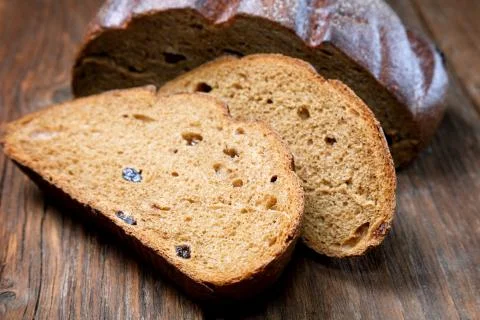 Pieces of rye bread  on a rural table Stock Photos