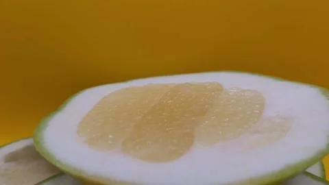Pieces of sliced grapefruit on a beautiful background. Stock Footage 291517326