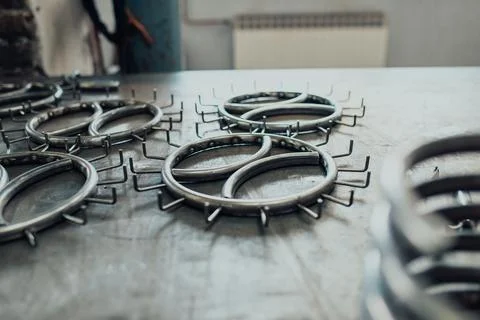 Pieces of steel lined up on the table ready for the welding process Stock-Fotos
