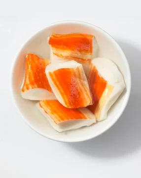 Pieces of surimi in a dish Stock Photos