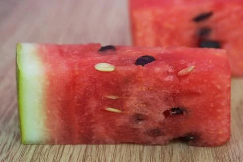 Pieces of watermelon on table Stock Photos