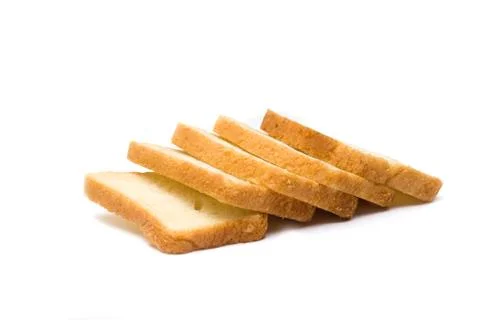 Pieces of white bread on white background Stock Photos
