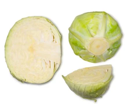 Pieces of white cabbage on a white background. From the garden. Vegetable iso Stock Photos