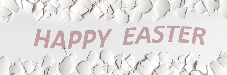 Pieces of white eggshell of broken chicken egg isolated on white background.. 库存照片