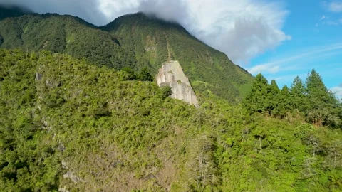Piedra de la Luz rock monolith in lush Andean mountains Ecuador Stock Footage 328645840