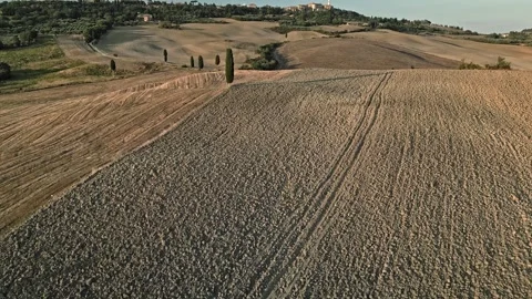 Pienza, Italy RISER from the fields drone view 4K Stock Footage 252143764