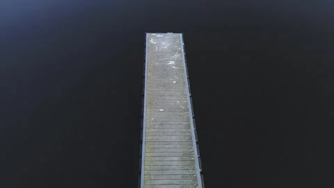 Pier on Alpine lake in summer Video stock 324863628