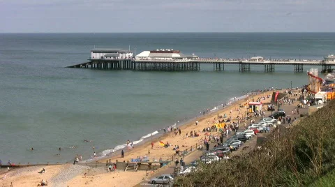 Pier and sandy beach at Cromer Norfolk England Stock Footage